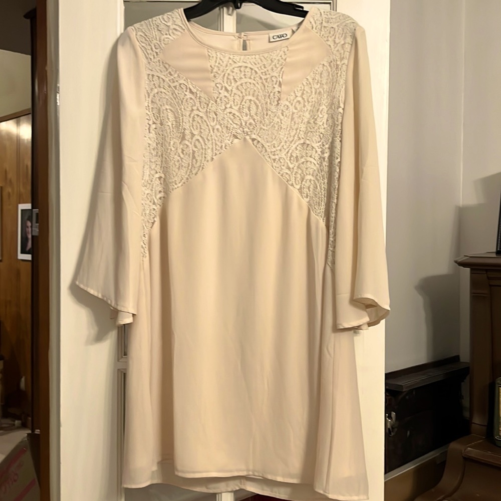 Cream color dress with lace front around chest. Cato‘s brand